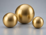 CGI product concept of Brass Balls; illustrative material and geometry
