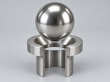 Conceptual CGI: Complete Specified duplex or superduplex stainless steel; exact grade subject to project review sphere above a conical annular seat and an aligned open vertical bore; axial component contact concept